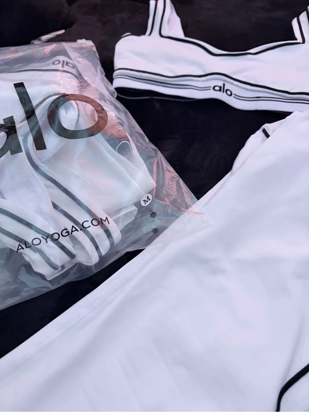 ALO Yoga White Sports Bra with Black Piping